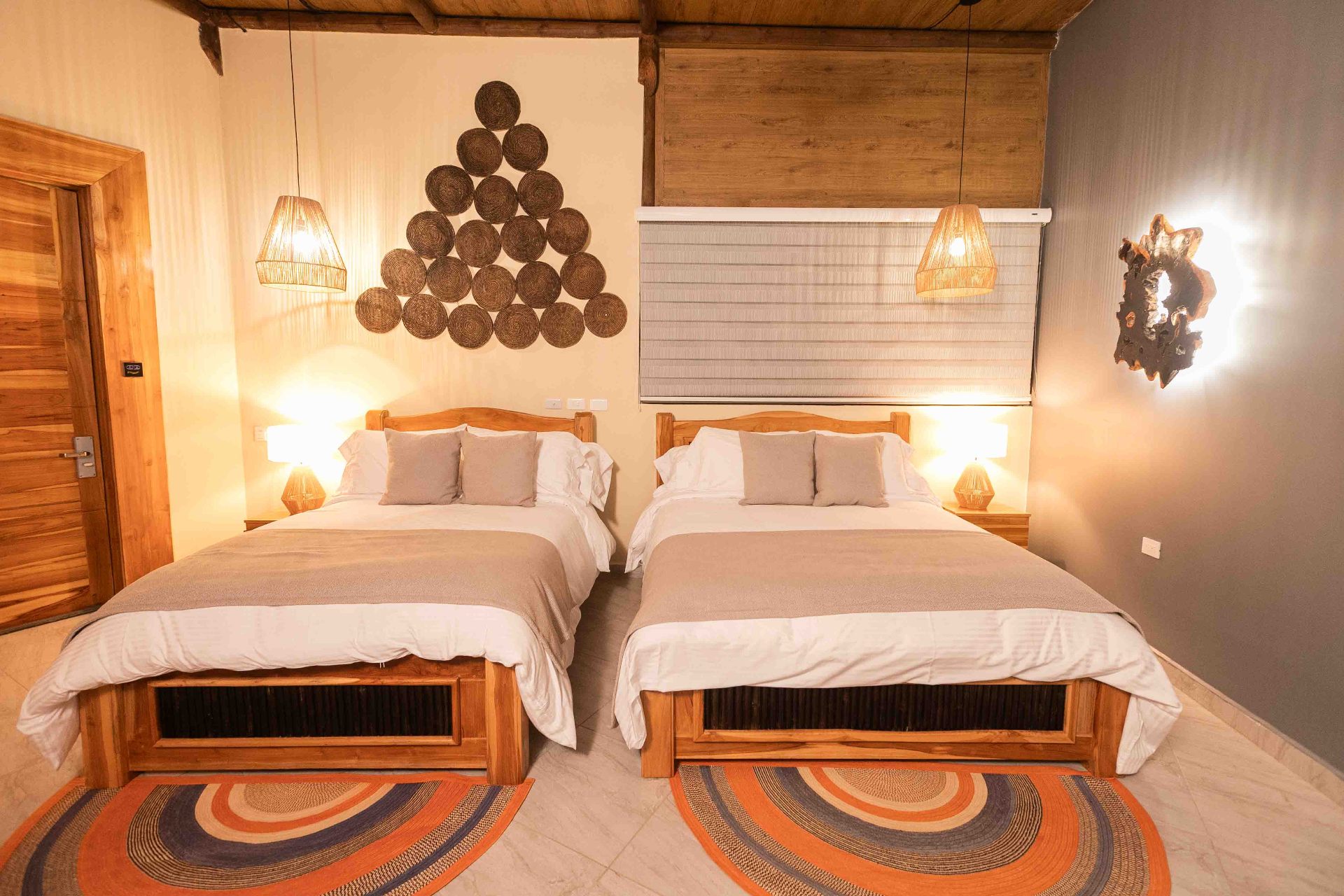 Family villa with pendant lamps and Caribbean decor at Marahuaco Beach House